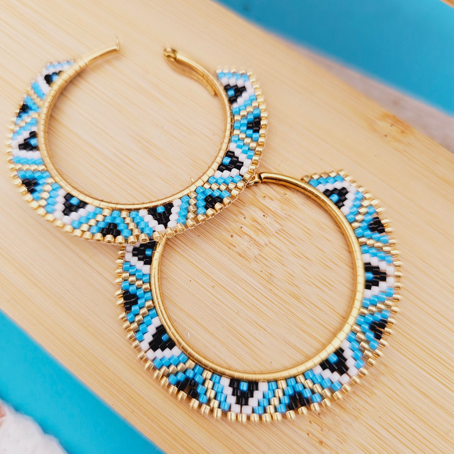 Blue beaded hoops